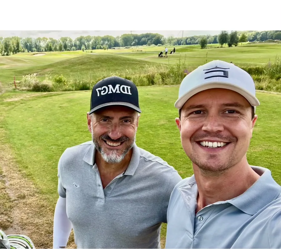 Pedro Nogueira with a fellow golfer on the fairway between shots