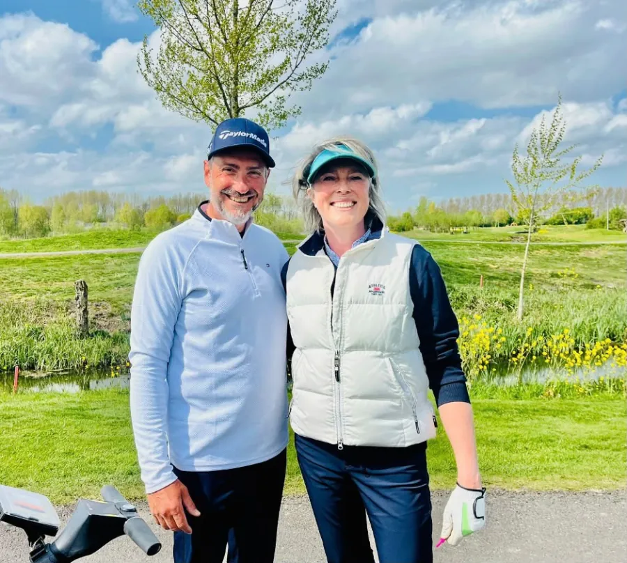 Pedro Nogueira with a fellow golfer smiling on the course